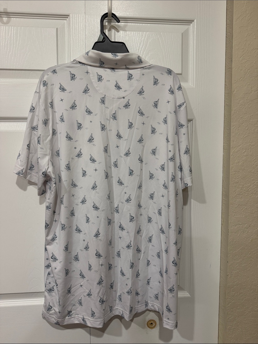 Men's White Short-Sleeve Polo with Navy Sailboat Print